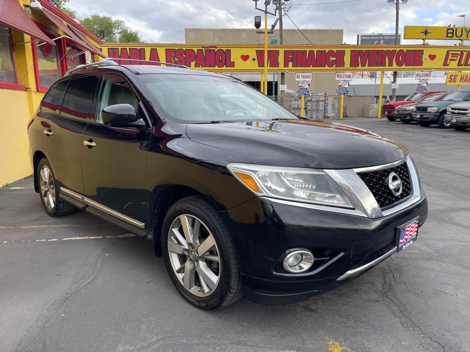 2014 Black /Tan Nissan Pathfinder Platinum (5N1AR2MM1EC) with an 3.5 Liter V6 engine, Automatic transmission, located at 801 South State Street, Salt Lake City, UT, 84111, (801) 328-0098, 40.751953, -111.888206 - Features: 20 Inch Plus Wheels, Power Hatch/Deck Lid, 4WD/AWD, Premium Package, A/C Seat(s), Rear Air Conditioning, Alloy Wheels, Rear Entertainment System, BOSE Sound System, Rear Seat Heaters, Bluetooth Technology, Rear View Camera, Fold-Away Third Row, Remote Start, Front Seat Heaters, Satellite R - Photo #4